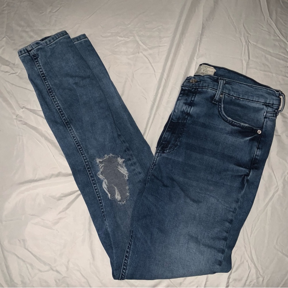 Free People high-waisted skinny jeans with knee holes